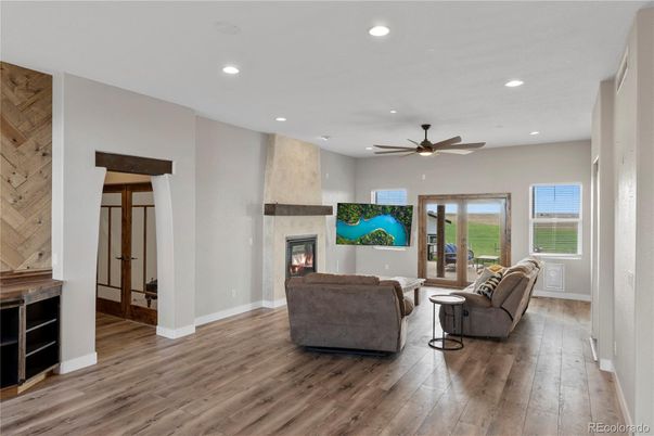 Fireplace, Interior, Living room, Recessed Lighting, Wood Texture Flooring