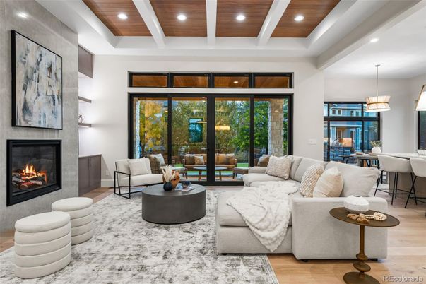 Dining room, Fireplace, Interior, Living room, Pendant Lights, Recessed Lighting, Wooden Ceilings, Wood Texture Flooring