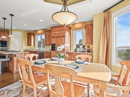 Dining room, Interior, Kitchen, Pendant Lights, Recessed Lighting, Stainless Steel Appliances, Wood Texture Flooring