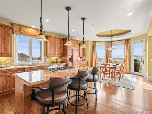 Dining room, Interior, Kitchen, Pendant Lights, Recessed Lighting, Stainless Steel Appliances, Wood Texture Flooring
