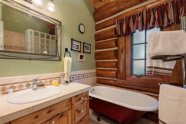 Bathroom, Dual Sink Vanities, Free Standing Baths, Interior, Tile Countertops, Wooden Walls