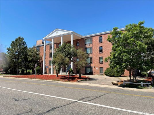 Exterior, Facade, Brick Facade, Condo Building