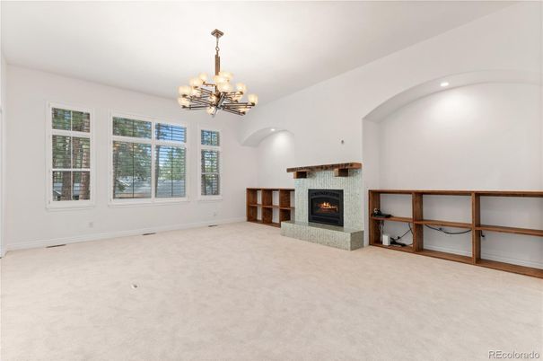 Chandelier, Empty room, Fireplace, Interior