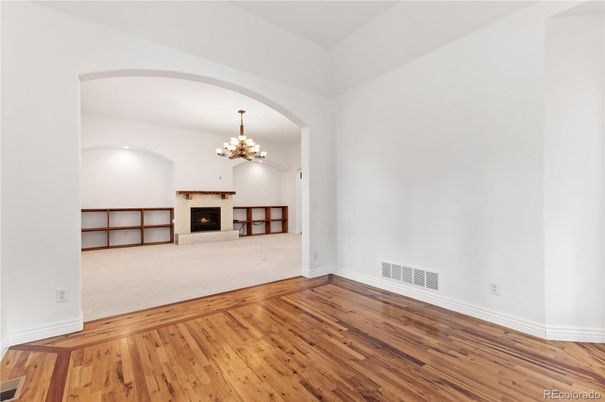 Chandelier, Empty room, Fireplace, Interior, Wood Texture Flooring