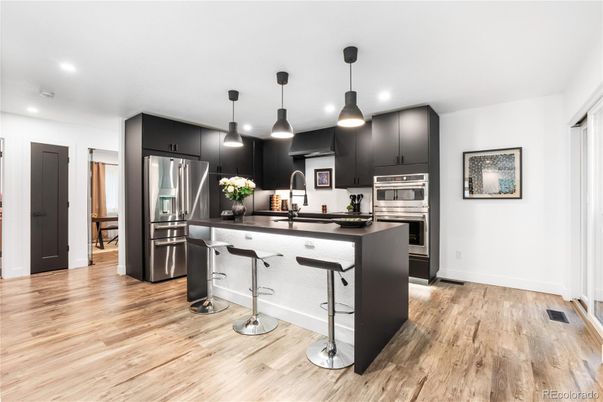 Interior, Kitchen, Pendant Lights, Recessed Lighting, Stainless Steel Appliances, Wood Texture Flooring