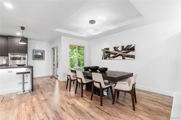 Dining room, Interior, Kitchen, Pendant Lights, Recessed Lighting, Stainless Steel Appliances, Wood Texture Flooring