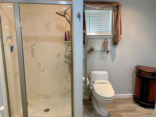 Bathroom, Glass Shower, Interior, Marble Walls, Wood Texture Flooring