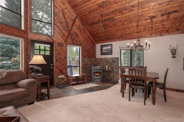 Chandelier, Dining room, Fireplace, Interior, Wooden Ceilings, Wooden Walls