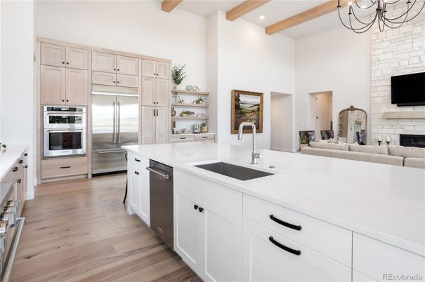 Fireplace, Interior, Kitchen, Recessed Lighting, Stainless Steel Appliances, Stone Walls, Wooden Beams, Wood Texture Flooring