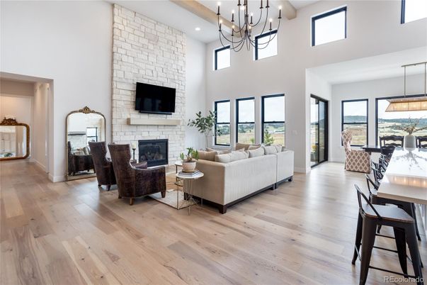 Dining room, Fireplace, Interior, Living room, Pendant Lights, Recessed Lighting, Stone Walls, Wood Texture Flooring