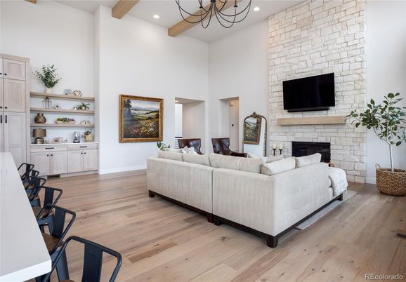 Fireplace, Interior, Living room, Recessed Lighting, Stone Walls, Wooden Beams, Wood Texture Flooring