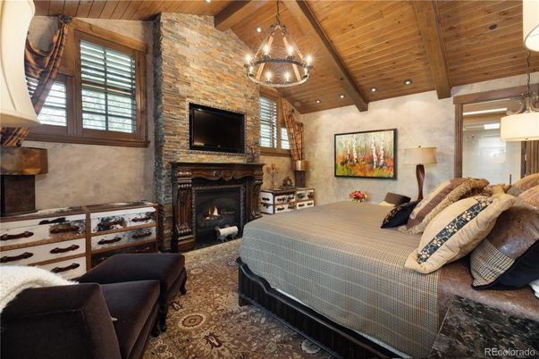Bedroom, Fireplace, Interior, Pendant Lights, Recessed Lighting, Stone Walls, Wooden Beams, Wooden Ceilings