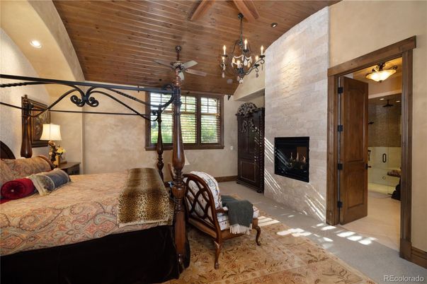 Bedroom, Chandelier, Fireplace, Interior, Recessed Lighting, Wooden Ceilings
