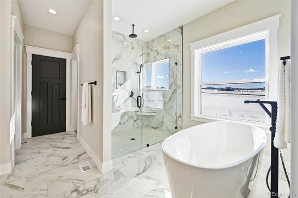 Bathroom, Free Standing Baths, Glass Shower, Interior, Marble, Marble Walls, Recessed Lighting