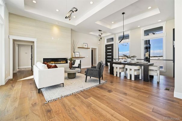 Dining room, Fireplace, Interior, Living room, Pendant Lights, Recessed Lighting, Wood Texture Flooring