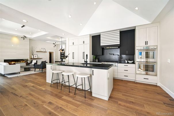 Fireplace, Interior, Kitchen, Living room, Pendant Lights, Recessed Lighting, Stainless Steel Appliances, Wood Texture Flooring