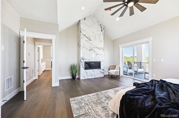 Bedroom, Fireplace, Interior, Marble Walls, Recessed Lighting, Wood Texture Flooring