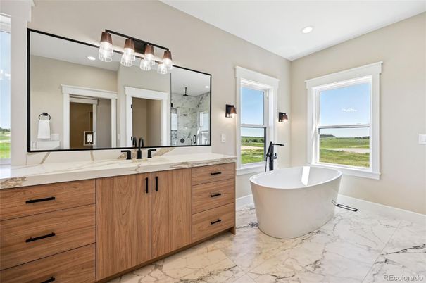 Bathroom, Dual Sink Vanities, Free Standing Baths, Interior, Marble, Marble Walls, Recessed Lighting, Water