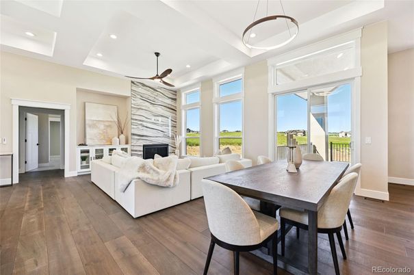 Dining room, Fireplace, Interior, Living room, Pendant Lights, Recessed Lighting, Wood Texture Flooring