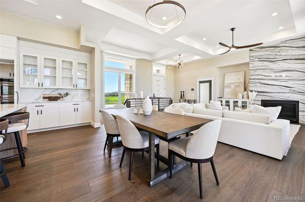 Dining room, Fireplace, Interior, Living room, Pendant Lights, Recessed Lighting, Wood Texture Flooring