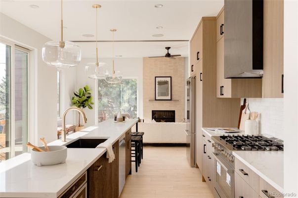 Fireplace, Interior, Kitchen, Pendant Lights, Recessed Lighting, Stainless Steel Appliances, Wood Texture Flooring