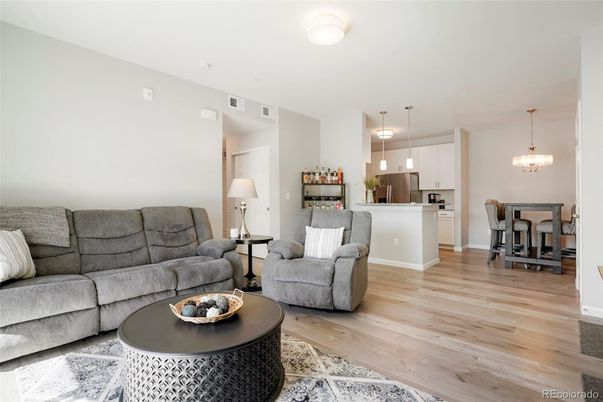 Dining room, Interior, Kitchen, Living room, Pendant Lights, Stainless Steel Appliances, Wood Texture Flooring
