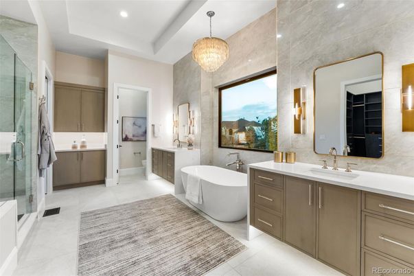 Bathroom, Chandelier, Dual Sink Vanities, Free Standing Baths, Glass Shower, Interior, Pendant Lights, Recessed Lighting
