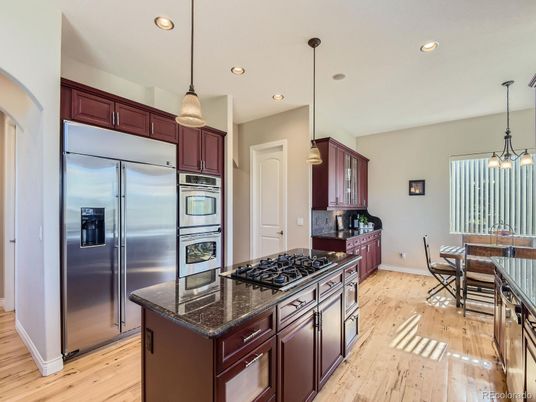 Dining room, Interior, Kitchen, Pendant Lights, Recessed Lighting, Stainless Steel Appliances, Wood Texture Flooring