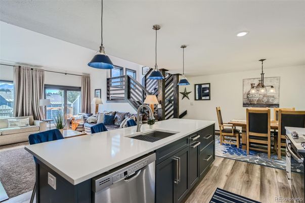 Dining room, Interior, Kitchen, Living room, Pendant Lights, Recessed Lighting, Stainless Steel Appliances, Wood Texture Flooring