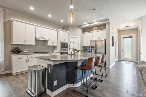 Interior, Kitchen, Pendant Lights, Recessed Lighting, Stainless Steel Appliances, Wood Texture Flooring