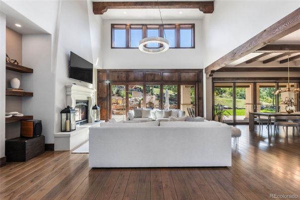 Dining room, Fireplace, Interior, Living room, Pendant Lights, Recessed Lighting, Wooden Beams, Wood Texture Flooring