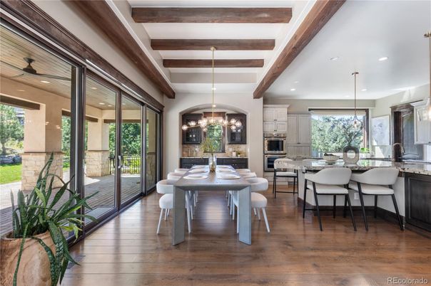 Chandelier, Dining room, Interior, Kitchen, Pendant Lights, Recessed Lighting, Stainless Steel Appliances, Wooden Beams, Wood Texture Flooring