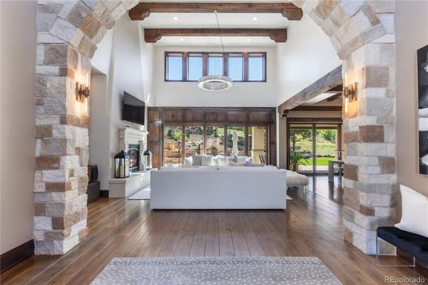 Fireplace, Interior, Living room, Pendant Lights, Recessed Lighting, Stone Walls, Wooden Beams, Wood Texture Flooring