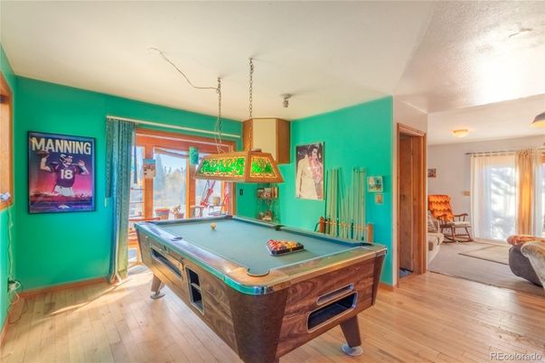 Billiard Table, Game Room, Interior, Pendant Lights, Wood Texture Flooring