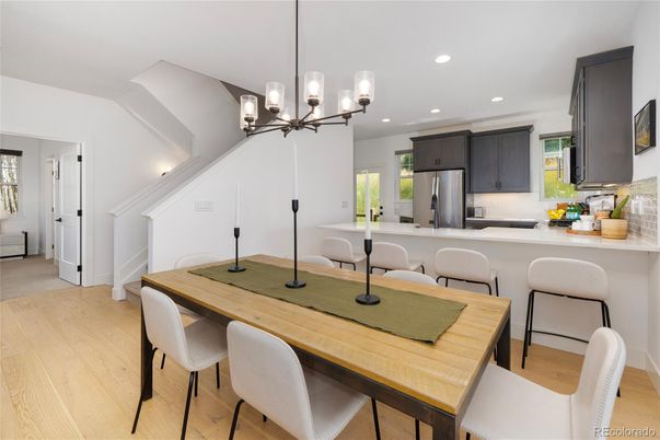 Dining room, Interior, Kitchen, Pendant Lights, Recessed Lighting, Stainless Steel Appliances, Wood Texture Flooring