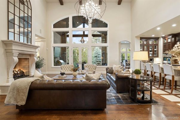 Chandelier, Dining room, Fireplace, Interior, Living room, Recessed Lighting, Wooden Beams, Wood Texture Flooring
