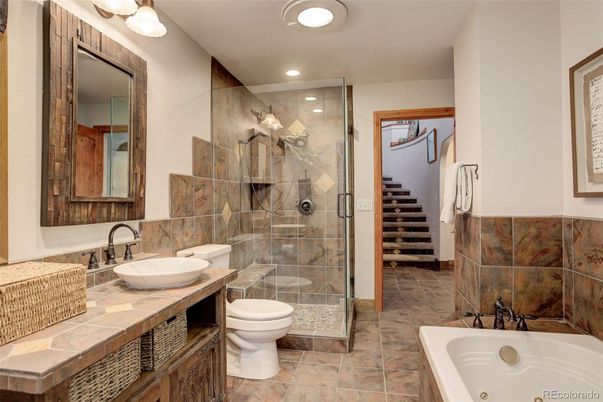 Bathroom, Dual Sink Vanities, Glass Shower, Interior, Recessed Lighting, Tile Countertops