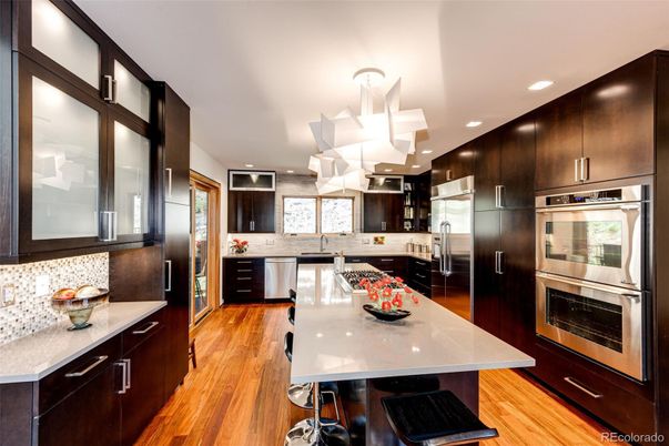 Interior, Kitchen, Pendant Lights, Recessed Lighting, Stainless Steel Appliances, Wood Texture Flooring