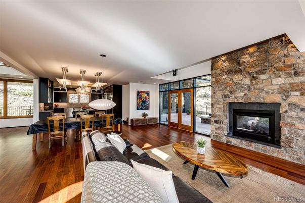 Dining room, Fireplace, Interior, Kitchen, Living room, Pendant Lights, Recessed Lighting, Stone Walls, Wood Texture Flooring