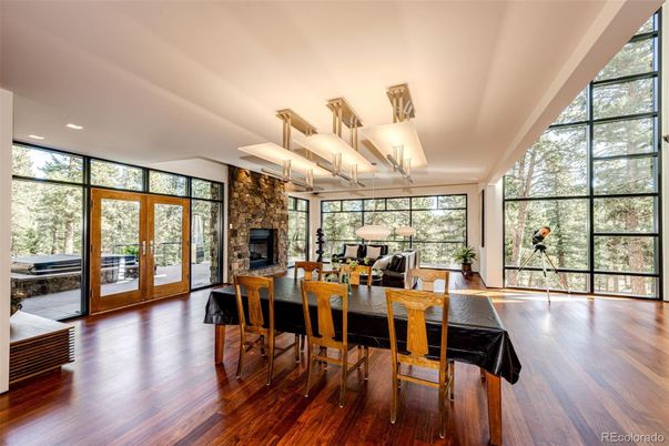 Dining room, Fireplace, Interior, Living room, Recessed Lighting, Wood Texture Flooring