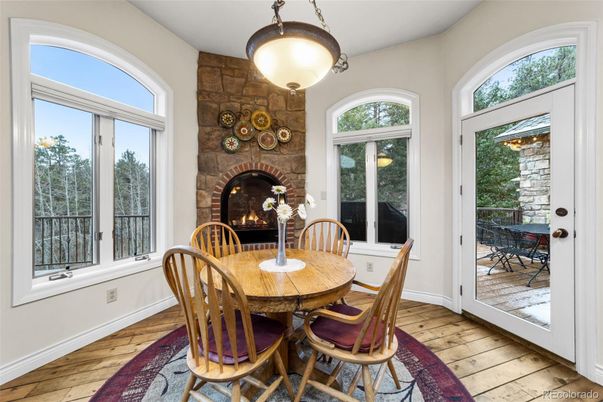 Dining room, Fireplace, Interior, Stone Walls, Wood Texture Flooring