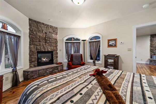 Bedroom, Fireplace, Interior, Stone Walls, Wood Texture Flooring