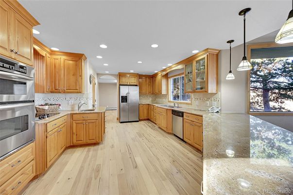 Interior, Kitchen, Pendant Lights, Recessed Lighting, Stainless Steel Appliances, Wood Texture Flooring