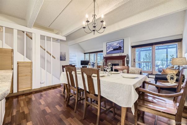 Chandelier, Dining room, Fireplace, Interior, Wood Texture Flooring