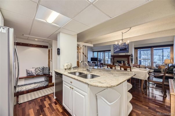 Chandelier, Dining room, Fireplace, Interior, Kitchen, Living room, Recessed Lighting, Wood Texture Flooring