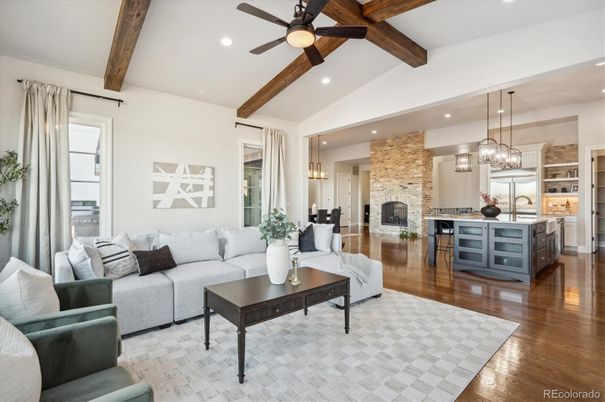 Dining room, Fireplace, Interior, Kitchen, Living room, Pendant Lights, Recessed Lighting, Stainless Steel Appliances, Stone Walls, Wooden Beams, Wood Texture Flooring