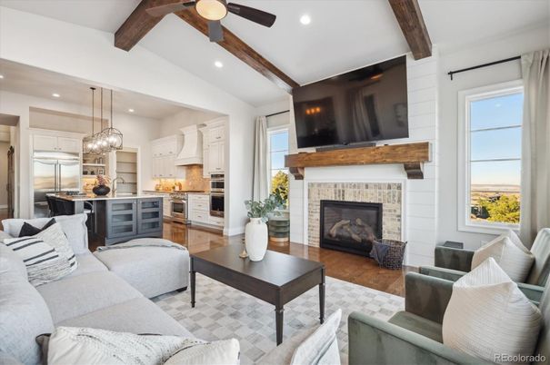 Fireplace, Interior, Kitchen, Living room, Pendant Lights, Recessed Lighting, Stainless Steel Appliances, Wooden Beams, Wood Texture Flooring