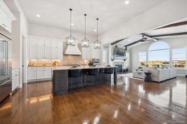 Fireplace, Interior, Kitchen, Living room, Pendant Lights, Recessed Lighting, Stainless Steel Appliances, Wood Texture Flooring