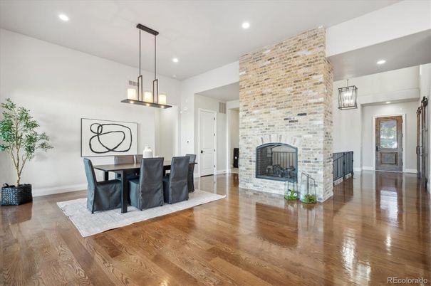 Dining room, Fireplace, Interior, Pendant Lights, Recessed Lighting, Wood Texture Flooring