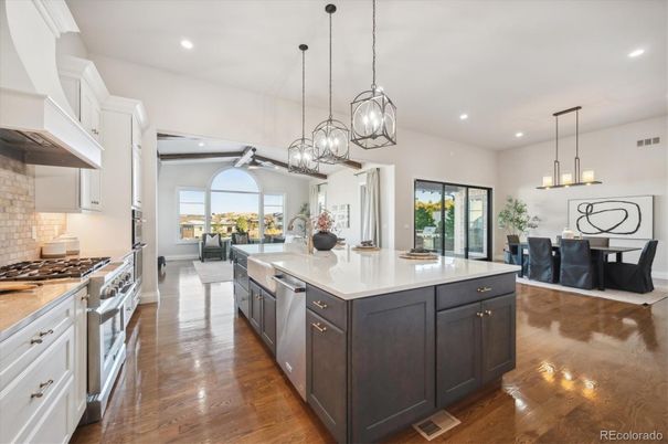 Dining room, Interior, Kitchen, Living room, Pendant Lights, Recessed Lighting, Stainless Steel Appliances, Wood Texture Flooring